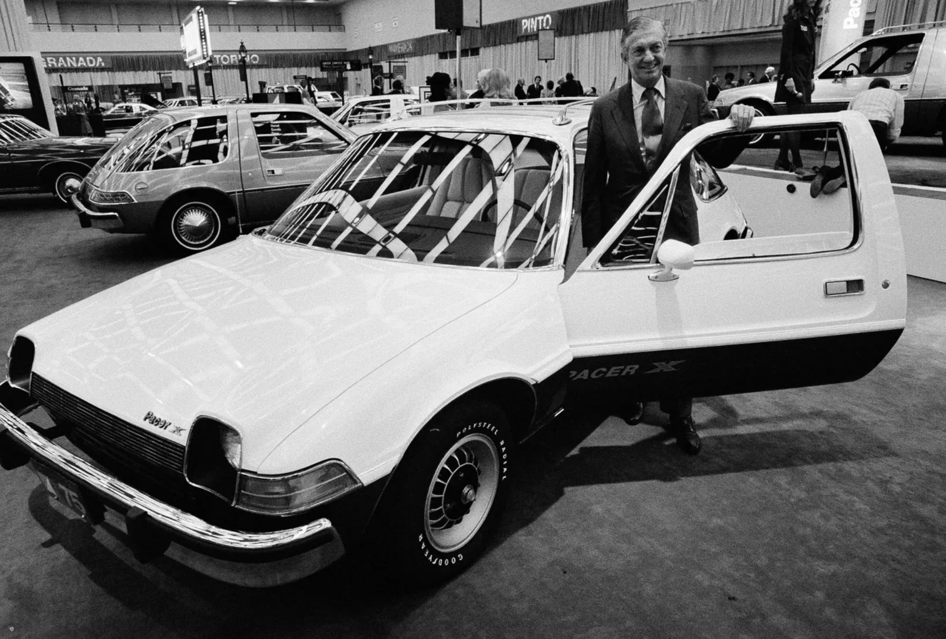 American Motors' board chairman Roy D. Chapin checks over the company's new sub-compact Pacer